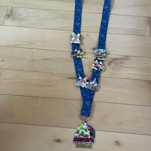 Disney Pins and Blue Lanyard New